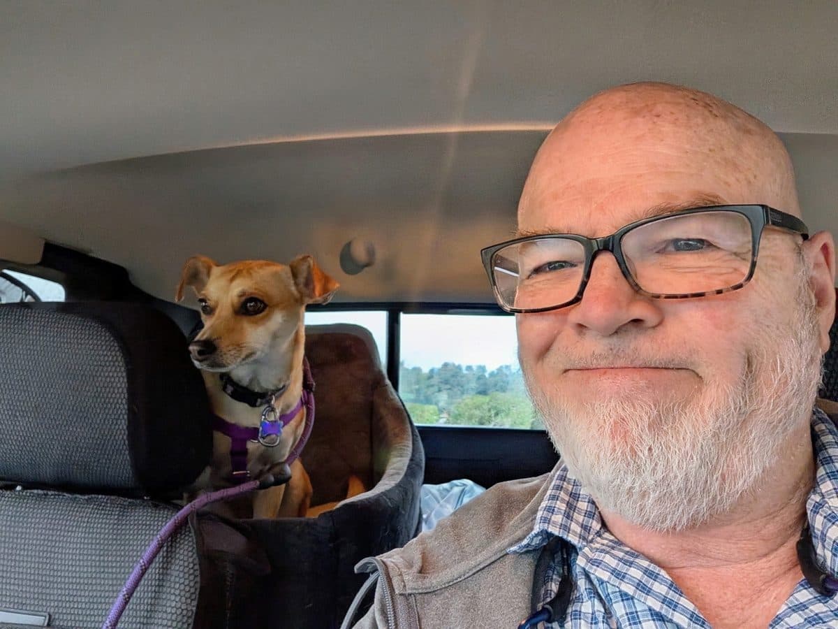 Brien in the truck with Lucy in the back seat