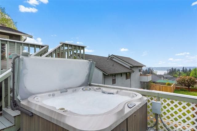 Hot tub on side deck looking out at the Olympic Mountain view