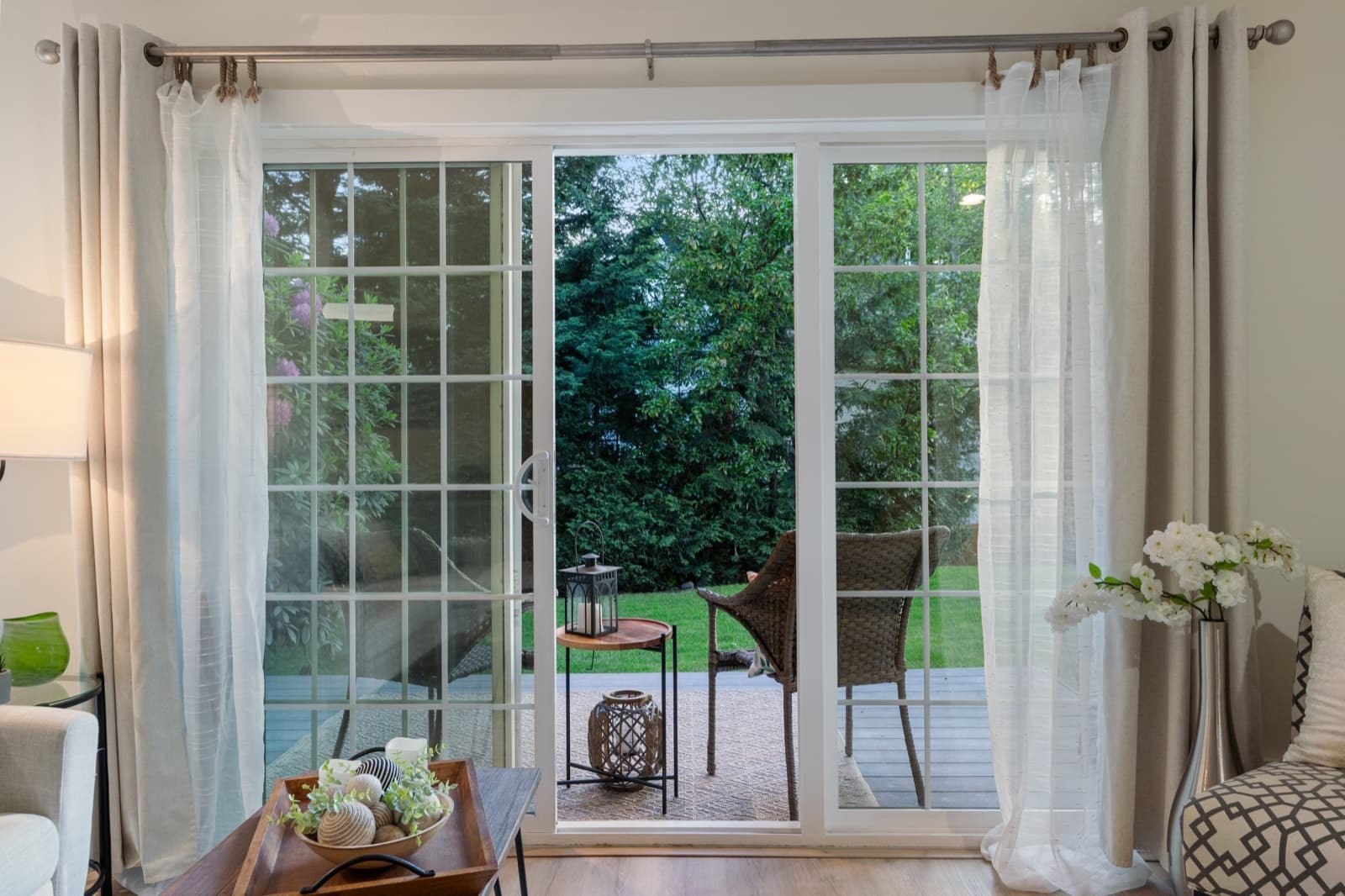 Slider to private patio with lawn beyond at 11706 Admiralty Way Unit B