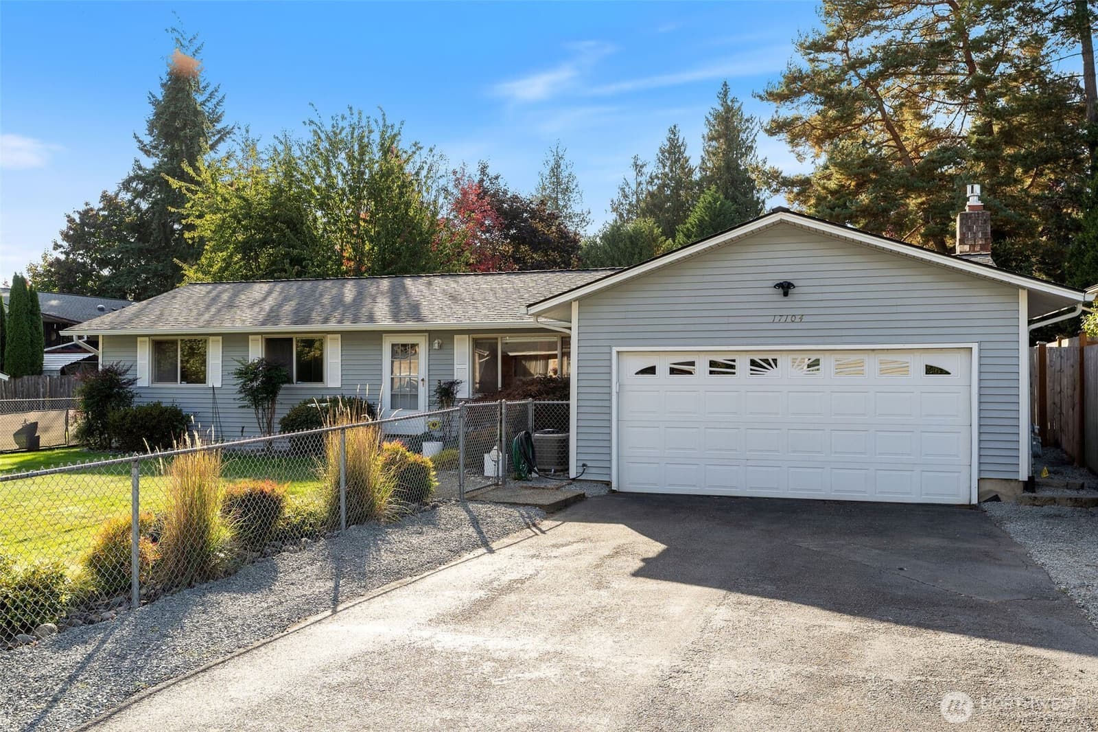 Front of 17104 24th Ave SE, Bothell WA, a single-level home with an attached two-car garage