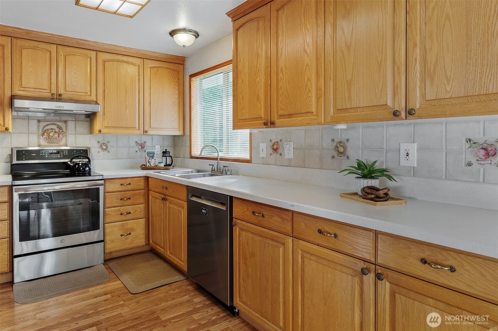 Kitchen with dishwasher and full-height cabinets at 17104 24th Ave SE, Bothell WA